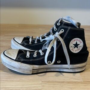 Converse Chuck Taylor all star hi top sneaker. Size 4. Black. Used condition.